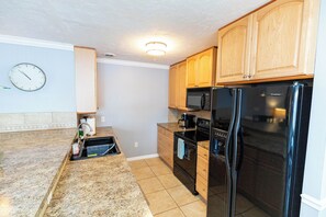 Private kitchen - Million Dollar Caloosahatchee River View from your Lanai and Dining Room Table! (Frot Myers)
