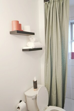 Hair dryer, towels, soap, shampoo