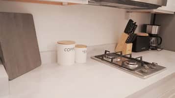Fridge, microwave, stovetop, coffee/tea maker