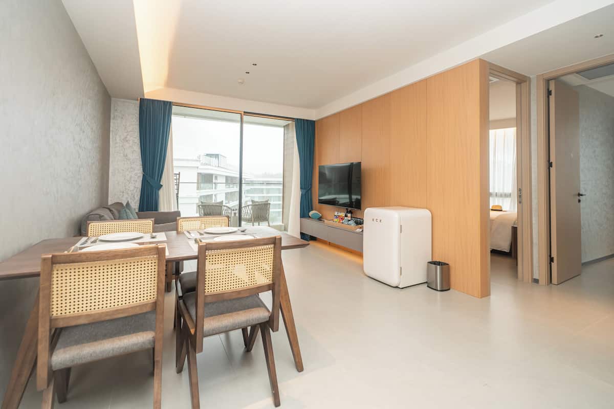 Premier Suite, 2 Bedrooms, Balcony, Pool View | Living area | 41-inch TV with digital channels, toys, computer monitors