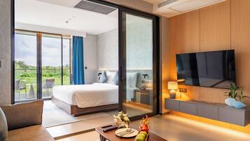 Family Suite, 2 Bedrooms, Balcony, Pool View | Minibar, in-room safe, desk, laptop workspace