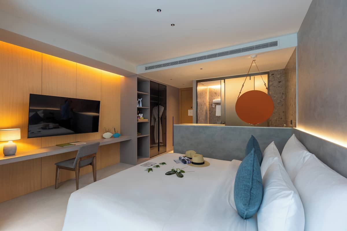 Deluxe Double or Twin Room, Balcony, Resort View | Minibar, in-room safe, desk, laptop workspace
