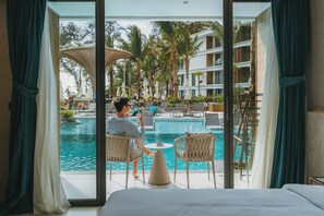 Premium Triple Room, 1 King Bed, Poolside | Terrace/patio - Kora Beach Resort Phuket (Choeng Thale)