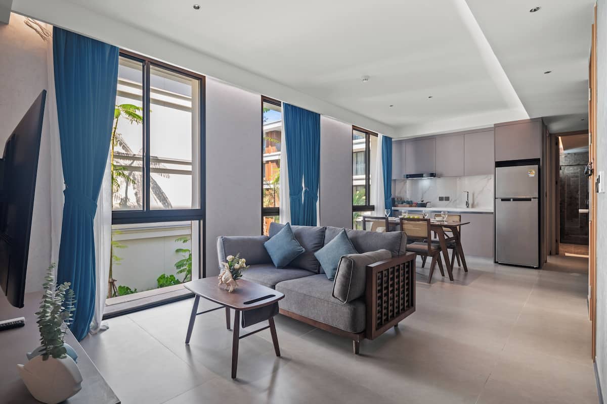 Grand Suite, 2 Bedrooms, Balcony, Pool View | Minibar, in-room safe, desk, laptop workspace