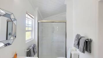 Shower, hair dryer, towels