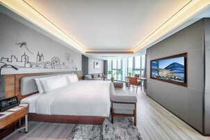 Superior Suite, City View | Down comforters, in-room safe, WiFi (free), bed sheets