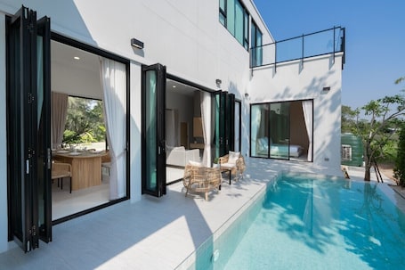 Deluxe Villa, 3 Bedrooms, Pool View | Living area | 32-inch flat-screen TV with cable channels