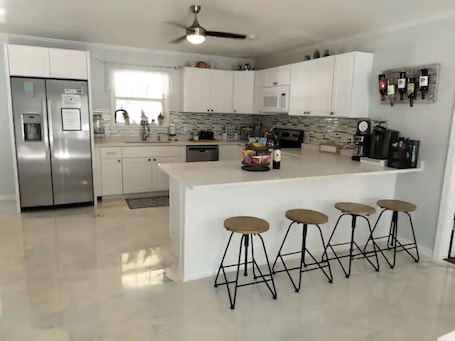 Fridge, microwave, oven, stovetop. "Charming 3 Bedroom Cottage at 3276 Old Moultrie Cozy Comfort Await !