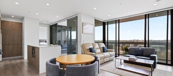 Luxe 2-Bed: Modern Interiors, Balcony & BBQ Area