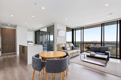 Luxe 2-Bed: Modern Interiors, Balcony & BBQ Area