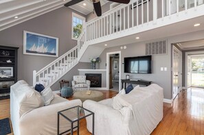 TV, fireplace, offices - Bayfront Retreat Near St. Michaels | Private Dock • Sunset Views (Tilghman Island)
