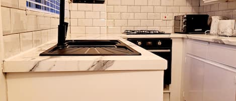 Microwave, oven, cookware/dishes/utensils