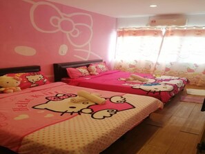 Desk, laptop workspace, bed sheets