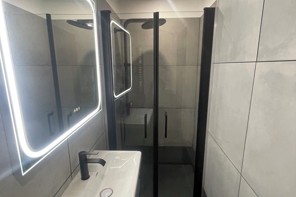 Shower, eco-friendly toiletries, hair dryer, towels