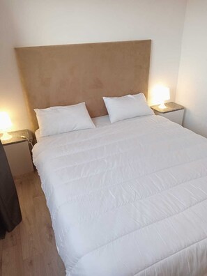 2 habitaciones, tabla de planchar con plancha y wifi gratis