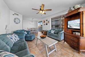 Signature Condo, 3 Bedrooms, Balcony, Beach View | Living room | 60-inch Smart TV with cable channels