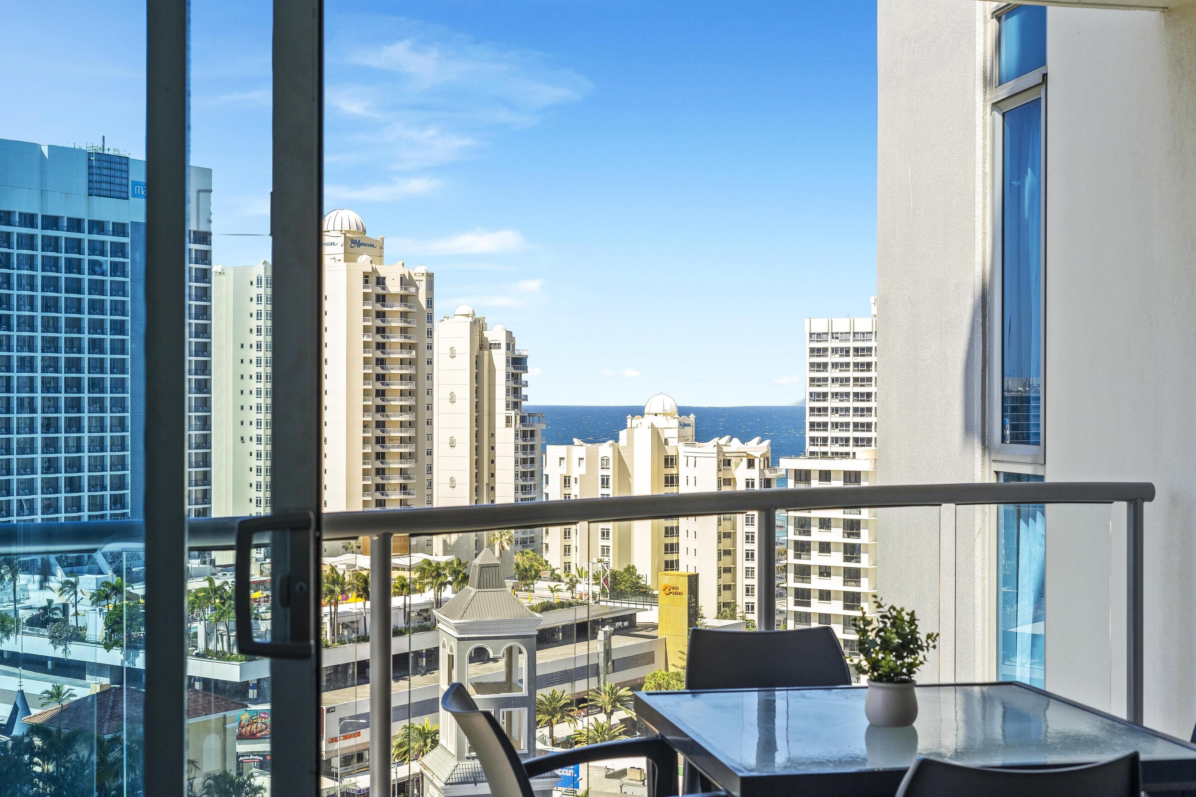 The picturesque city view with the ocean as the backdrop from the balcony