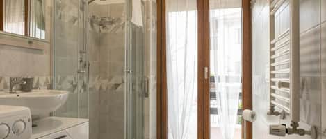 Hair dryer, bidet, towels, soap