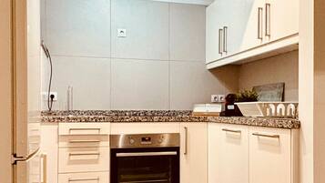 Fridge, coffee/tea maker, electric kettle, toaster