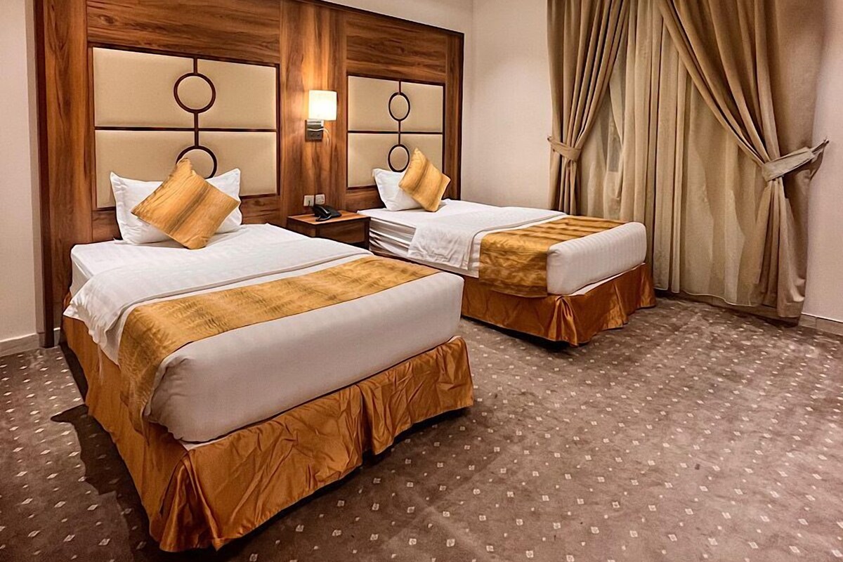 In-room safe, laptop workspace, blackout drapes, soundproofing