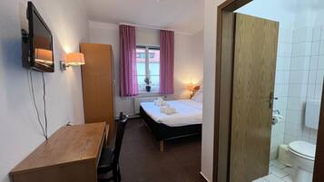 Shower, free toiletries, towels, toilet paper