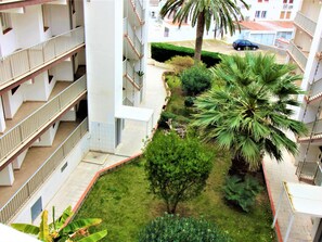 Property grounds - Cozy 2nd Line Beach Apartment in Santa Margarita, Wi-Fi, Terrace, Parking (Roses)