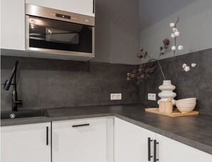 Réfrigérateur, four, plaque de cuisson, lave-vaisselle