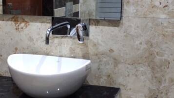 Shower, rainfall showerhead, towels, soap