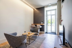 Appartement Confort | Coin séjour | Télévision