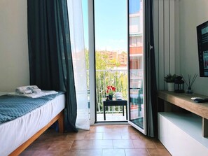 2 habitaciones, tabla de planchar con plancha, wifi y ropa de cama 