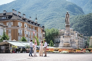 Stroll through the historic public square, surrounded by traditional European architecture and vibrant flower beds.