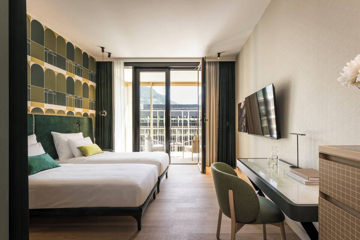 Premium Double Room, Balcony | Minibar, in-room safe, desk, laptop workspace