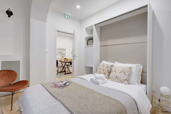 1 bedroom, desk, iron/ironing board, travel crib