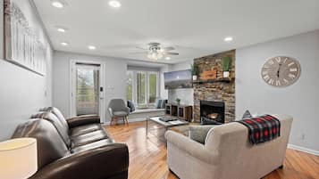 TV, fireplace, books, offices