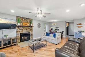 TV, fireplace, books, offices