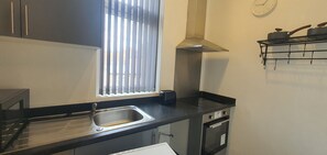 Apartamento, 1 quarto, vista para a cidade | Cozinha privada