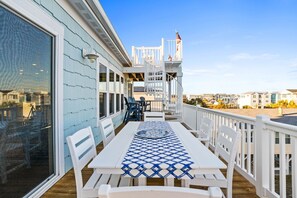 Outdoor dining - Easy Breezy is a stunning 4 bedroom, 4 bathroom house with a private pool and elevator (Sunset Beach)
