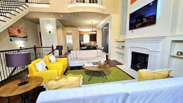 Smart TV, fireplace, books