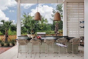 Outdoor dining - Luxurious Coastal Homes | Heated Pool (Bay St. Louis)