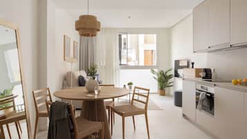 Family Studio | Living area | 50-inch Smart TV with digital channels