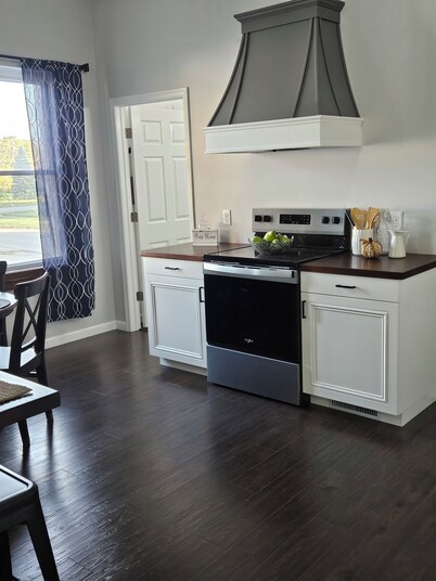 Country charm and modern finishes with beautiful open living and dining areas