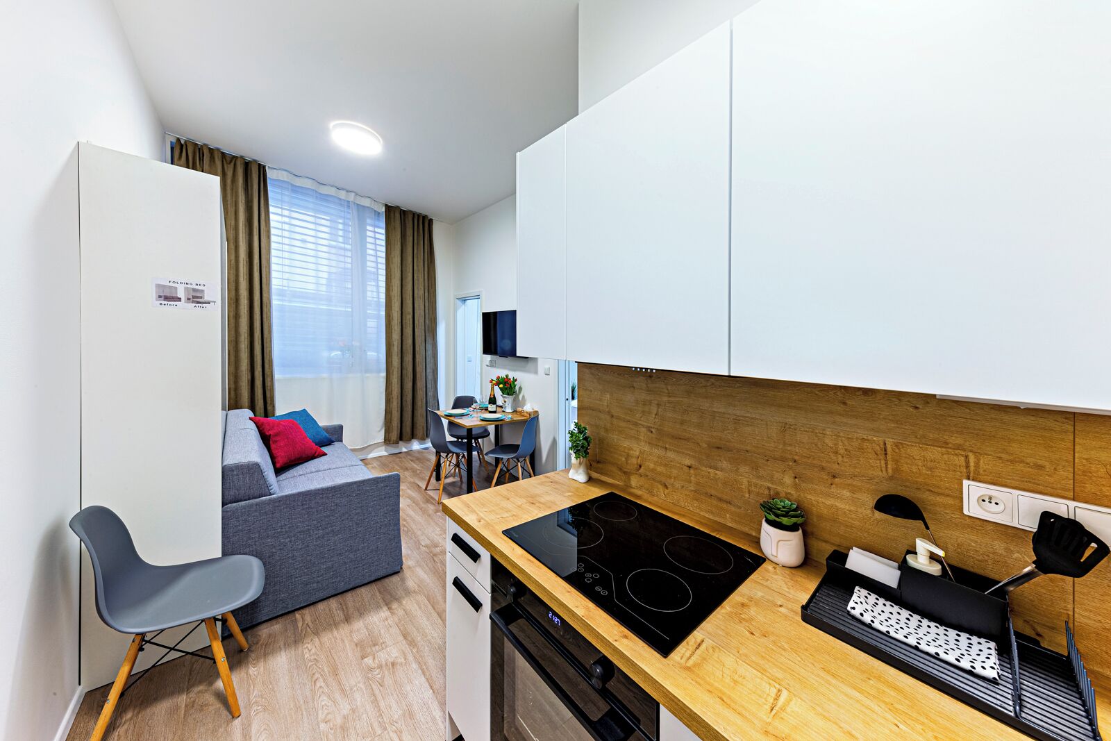 Family Apartment, 1 Bedroom, Courtyard View | In-room dining