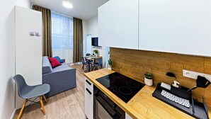 Family Apartment, 1 Bedroom, Courtyard View | In-room dining - MamaStay Andel apartments (Prague)