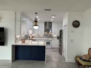 Fridge, microwave, oven, stovetop - Charming 2-bedroom beach condo in brilliant Cocoa Beach. (Cocoa Beach)