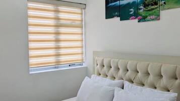 Appartement Deluxe, 3 chambres, vue golf | 1 chambre, fer et planche Ă repasser, Wi-Fi gratuit