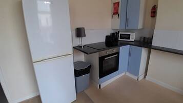 Apartemen | Dapur pribadi | Lemari es, microwave, oven, dan kompor