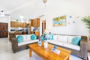 Family Apartment, Resort View | Living area | 40-inch Smart TV with cable channels, books - Oasis Cocotal - Punta Cana 4BR Apartment (Punta Cana)