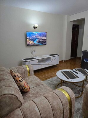 Comfort Apartment, Balcony, City View | Living area - Lux Suites Astrol Apartments Garden City (Nairobi)