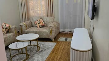 Comfort Apartment, Balcony, City View | Living area