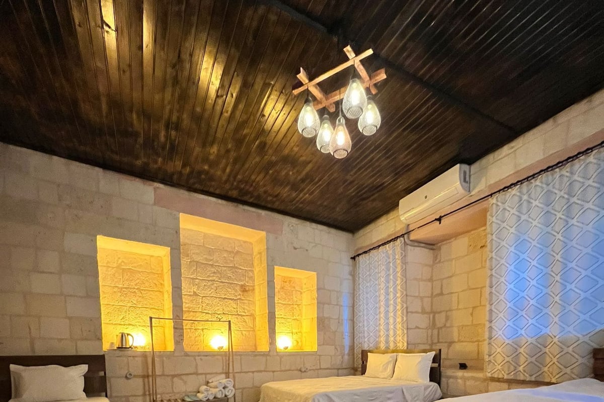 Economy Quadruple Room | Individually decorated, blackout drapes, soundproofing